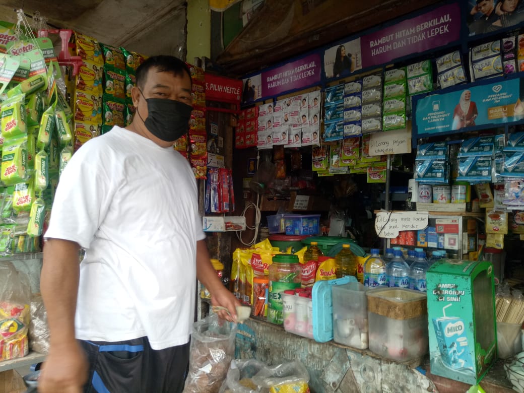 Edi Pedagang minyak goreng pasar tradisional jombang